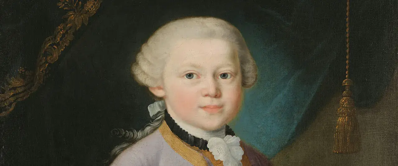 Portret młodego Wolfganga Amadeusza Mozarta w peruce i eleganckim stroju.