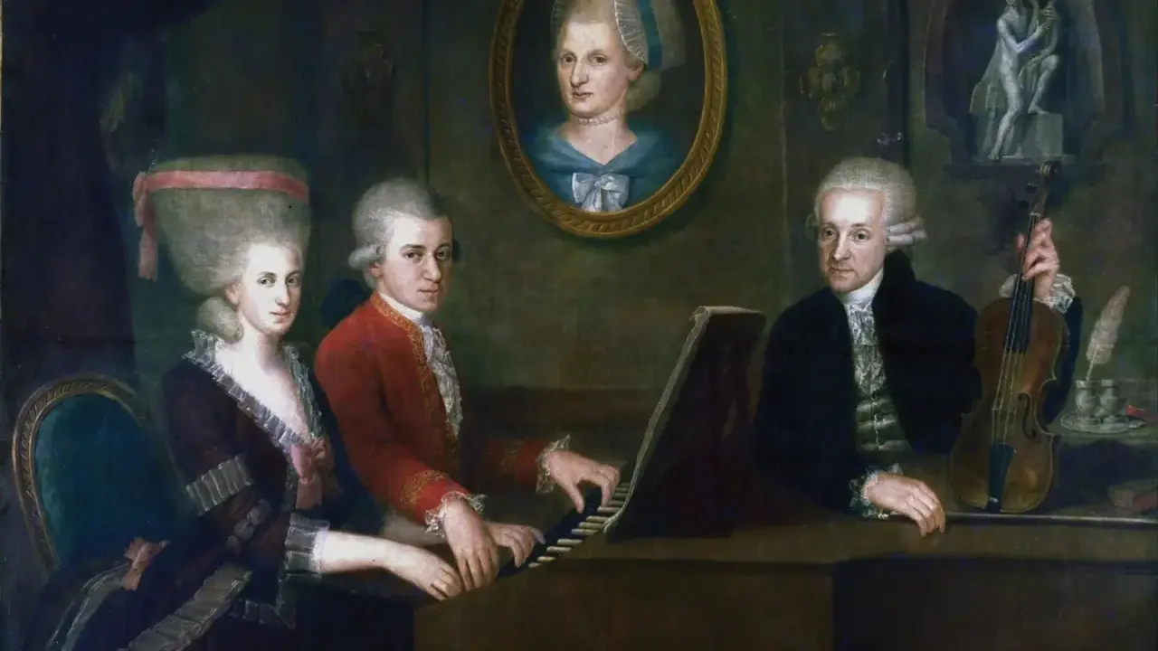 Portret rodziny Mozarta: Leopold, Wolfgang i Nannerl przy klawesynie. W tle portret Anny Marii Pertl.