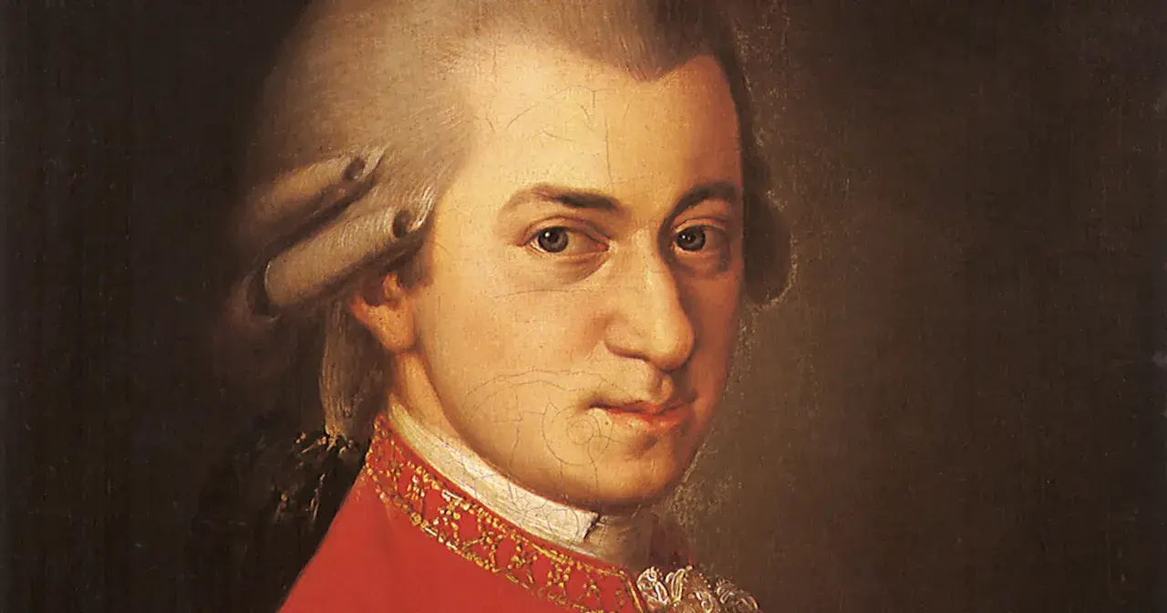 Portret Wolfganga Amadeusza Mozarta w czerwonym stroju. Wyobraźmy sobie, że to on opowiadał historie o swoich dzieciach.