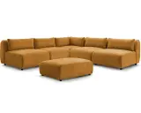 Pomarańczowa, modułowa sofa z pufą, idealna do relaksu, jak u Lecha Janerki, dupa jak sofa.