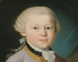 Portret młodego Wolfganga Amadeusza Mozarta w peruce i eleganckim stroju.