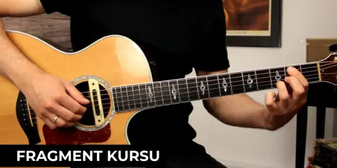 Fragment kursu: czy gra na gitarze jest trudna? Ręka na gryfie, palce układają akord.