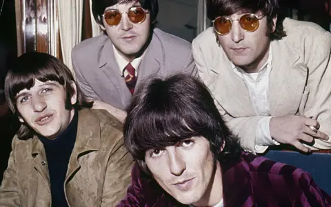 The Beatles, a legend, captured now and then. Ringo, Paul, John, and George, forever in our hearts.