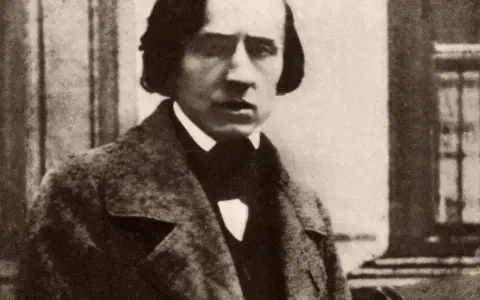 Portret Fryderyka Chopina w płaszczu i muszce. Zmarł, mając 39 lat.