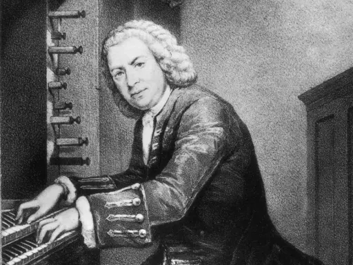 Johann Sebastian Bach, mistrz klawiatury, grający na organach. Jego dłonie spoczywają na klawiszach, a wzrok skierowany jest w stronę widza.