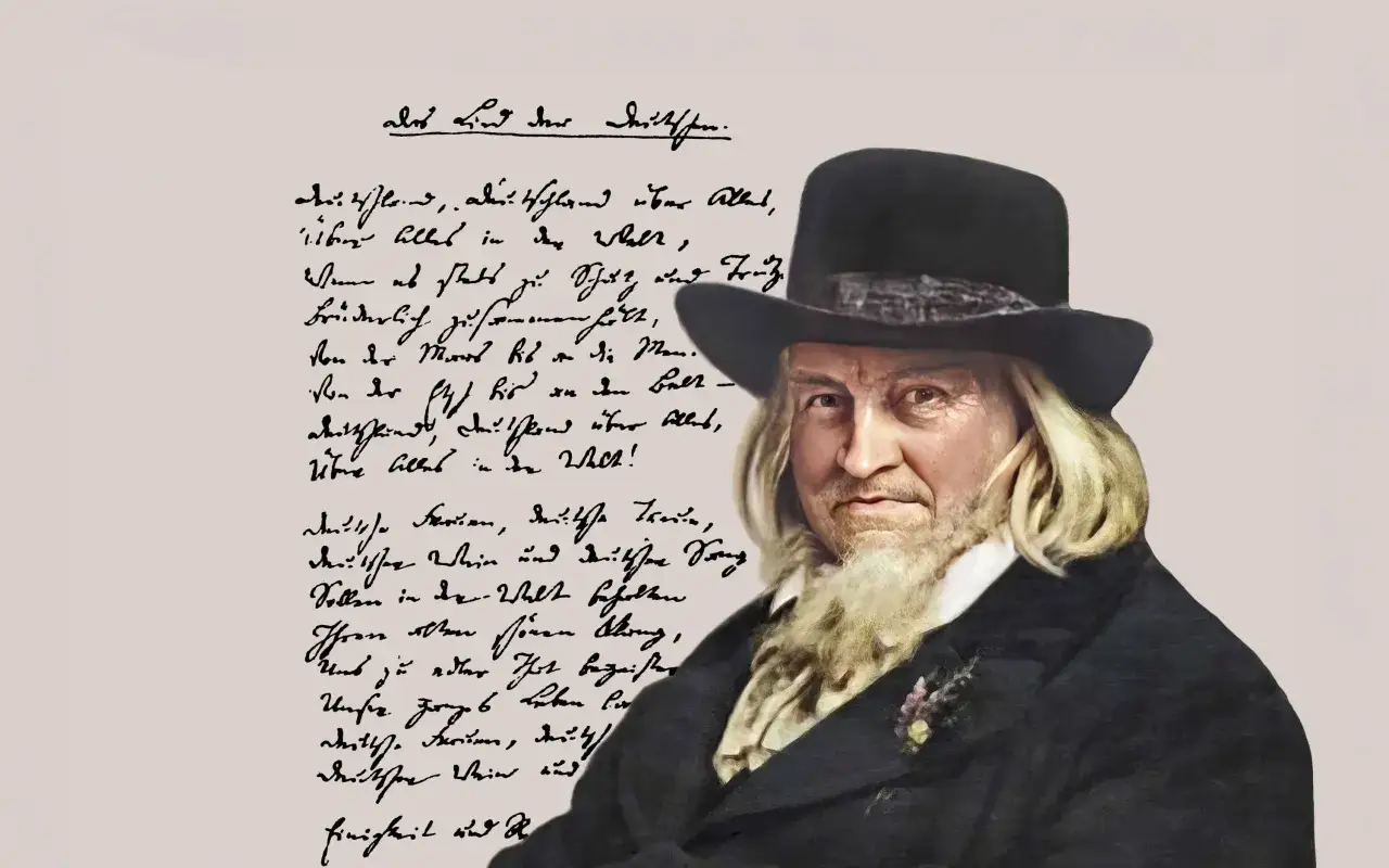 August Heinrich Hoffmann von Fallersleben, autor słów do hymnu Niemiec, na tle rękopisu.